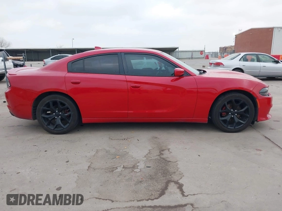 2015 Dodge Charger SXT z VIN 2C3CDXHG1FH901897, wystawiony jako IAAI lot #41795453 z przebiegiem 186 686 mil mil oraz . Historia ofert i sprzedaży dostępna na DreamBid. Obrazek 13.