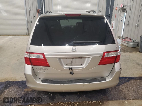 2006 Honda Odyssey EX-L z VIN 5FNRL38606B414740, wystawiony jako Copart lot #51861875 z przebiegiem 86 713 mil mil oraz Czysty tytuł • Clean title. Historia ofert i sprzedaży dostępna na DreamBid. Obrazek 6.
