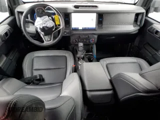 2024 Ford Bronco with VIN 1FMEE1BP6RLA41845, listed as a Copart auction lot 53920185 with 7,406 mi miles and Salvage title. Bid and sale history available at DreamBid. Image 8.