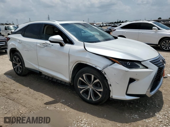 2016 Lexus RX 350 with VIN 2T2BZMCA1GC044207, listed as a Copart auction lot 54190245 with 156,285 mi miles and Salvage Title. Bid and sale history available at DreamBid. Image 4.