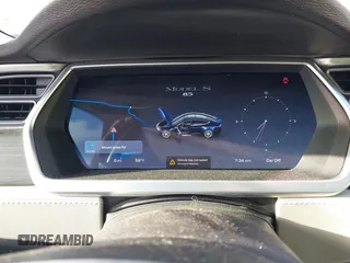 2014 Tesla Model S 60 z VIN 5YJSA1H11EFP30596, wystawiony jako IAAI lot #42235901 z przebiegiem 143 837 mil mil oraz . Historia ofert i sprzedaży dostępna na DreamBid. Obrazek 7.