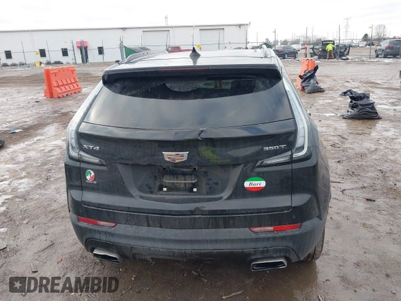 2021 Cadillac XT4 AWD Sport with VIN 1GYFZFR49MF065225, listed as a IAAI auction lot 41191994 with 58,095 mi miles and . Bid and sale history available at DreamBid. Image 16.