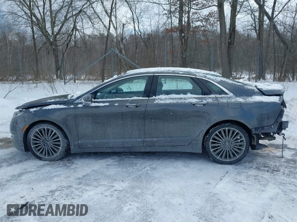 2015 Lincoln MKZ z VIN 3LN6L2J99FR606377, wystawiony jako IAAI lot #41597537 z przebiegiem 110 746 mil mil oraz . Historia ofert i sprzedaży dostępna na DreamBid. Obrazek 14.
