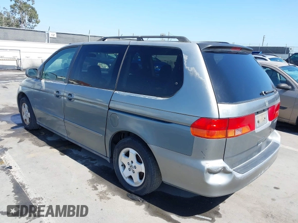 2001 Honda Odyssey EX z VIN 2HKRL18641H504729, wystawiony jako IAAI lot #42337944 z przebiegiem 203 356 mil mil oraz . Historia ofert i sprzedaży dostępna na DreamBid. Obrazek 3.