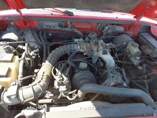2000 Ford Ranger XL with VIN 1FTYR10C7YPA11959, listed as a IAAI auction lot 41978386 with 221,706 mi miles. Bid and sale history available at carsss.com. Image 10.