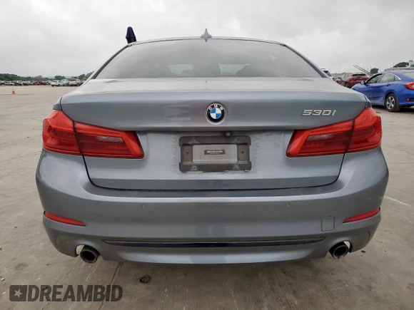 2018 BMW 5 Series 530i z VIN WBAJA5C51JWA37384, wystawiony jako Copart lot #55061215 z przebiegiem 113 809 mil mil oraz Szkody całkowita. Historia ofert i sprzedaży dostępna na DreamBid. Obrazek 6.