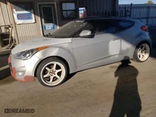 2016 Hyundai Veloster with VIN KMHTC6AD3GU265826, listed as a Copart auction lot 77306304 with 131,022 mi miles and Salvage Title. Bid and sale history available at carsss.com. Image 1.