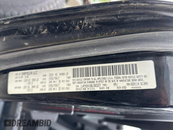 2008 Jeep Wrangler X with VIN 1J4FA24168L582227, listed as a Copart auction lot 58219065 with 98,284 mi miles and Salvage title. Bid and sale history available at DreamBid. Image 10.