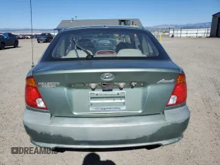 2003 Hyundai Accent GL with VIN KMHCG35C83U257641, listed as a Copart auction lot 73421464 with 143,814 mi miles and Clean Title. Bid and sale history available at carsss.com. Image 6.