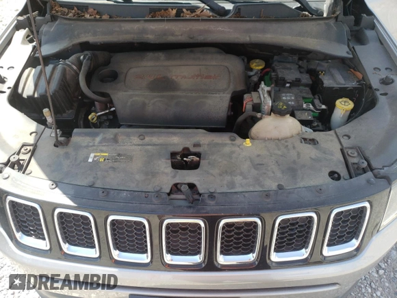 2017 Jeep Compass Sport z VIN 3C4NJCAB3HT652338, wystawiony jako Copart lot #63076055 z przebiegiem 109 701 mil mil oraz Szkoda całkowita • Salvage title. Historia ofert i sprzedaży dostępna na DreamBid. Obrazek 12.