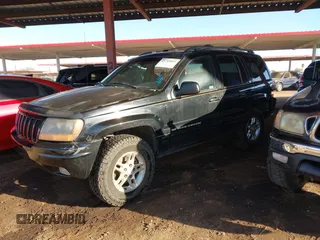 1999 Jeep Grand Cherokee Limited with VIN 1J4GW68N6XC675399, listed as a IAAI auction lot 41745815 with 217,800 mi miles. Bid and sale history available at carsss.com. Image 17.