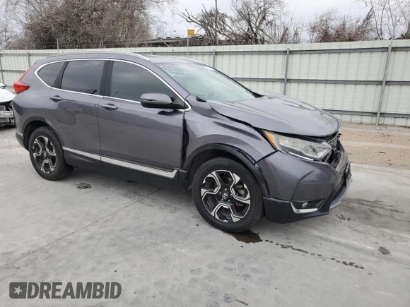 2017 Honda CR-V Touring with VIN 5J6RW2H97HL060219, listed as a Copart auction lot 45497645 with 144,724 mi miles and Salvage Title. Bid and sale history available at carsss.com. Image 4.