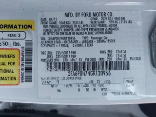 2016 Ford Fusion SE with VIN 3FA6P0H74GR120956, listed as a IAAI auction lot 41848468 with 239,358 mi miles. Bid and sale history available at carsss.com. Image 9.