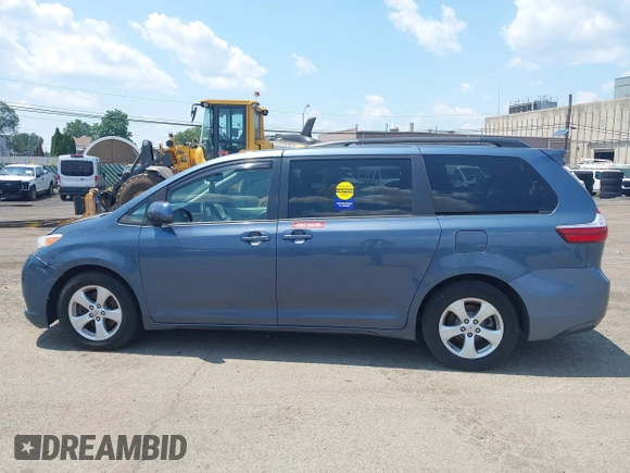 2015 Toyota Sienna LE AAS with VIN 5TDKK3DC1FS642029, listed as a IAAI auction lot 42618738 with 201,344 mi miles and . Bid and sale history available at DreamBid. Image 14.