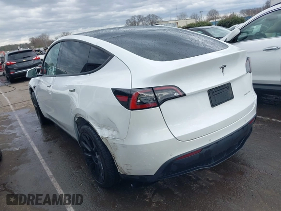 2022 Tesla Model Y Long Range with VIN 7SAYGDEE6NF461788, listed as a IAAI auction lot 41697064 with 34,034 mi miles and . Bid and sale history available at carsss.com. Image 3.