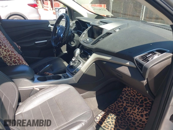 2013 Ford Escape SEL with VIN 1FMCU9HX0DUD42081, listed as a IAAI auction lot 42293456 with 100,013 mi miles and . Bid and sale history available at DreamBid. Image 5.