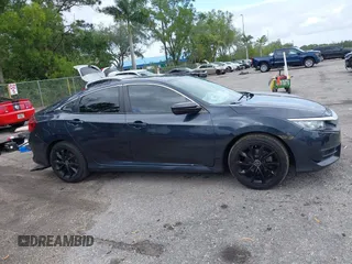 2016 Honda Civic Sedan LX with VIN 19XFC2F52GE069998, listed as a IAAI auction lot 42016233 with 93,990 mi miles. Bid and sale history available at carsss.com. Image 13.