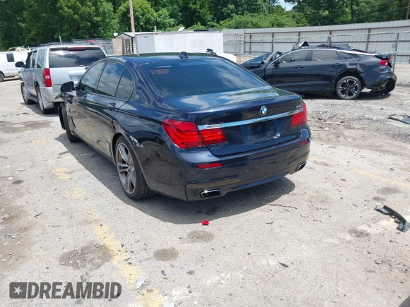 2015 BMW 7 Series 740i with VIN WBAYA6C59FD826726, listed as a IAAI auction lot 42254240 with 110,006 mi miles and . Bid and sale history available at DreamBid. Image 3.
