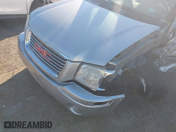 2008 GMC Envoy SLE2 with VIN 1GKDS13S082141895, listed as a IAAI auction lot 41596735 with 174,914 mi miles. Bid and sale history available at carsss.com. Image 6.
