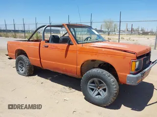 1991 GMC Sonoma z VIN 1GTCT14Z3M8509185, wystawiony jako IAAI lot #42489469 z przebiegiem 210 157 mil mil oraz . Historia ofert i sprzedaży dostępna na DreamBid. Obrazek 1.