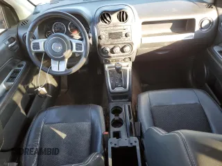 2015 Jeep Compass Latitude with VIN 1C4NJCEBXFD274712, listed as a Copart auction lot 41638375 with 142,684 mi miles and Salvage Title. Bid and sale history available at carsss.com. Image 8.