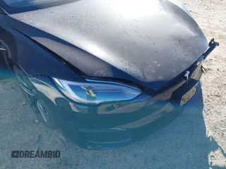 2021 Tesla Model S Long Range z VIN 5YJSA1E50MF438864, wystawiony jako IAAI lot #41190778 z przebiegiem Nie podano mil oraz . Historia ofert i sprzedaży dostępna na DreamBid. Obrazek 20.