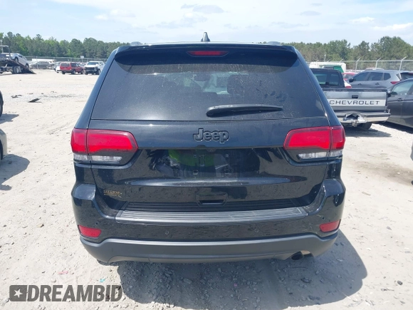 2021 Jeep Grand Cherokee Laredo E z VIN 1C4RJEAG9MC740244, wystawiony jako IAAI lot #42112847 z przebiegiem 32 897 mil mil oraz . Historia ofert i sprzedaży dostępna na DreamBid. Obrazek 16.