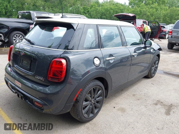 2019 MINI Hardtop 4 Door Cooper S z VIN WMWXU3C54K2H86856, wystawiony jako IAAI lot #42201474 z przebiegiem 56 610 mil mil oraz . Historia ofert i sprzedaży dostępna na DreamBid. Obrazek 4.