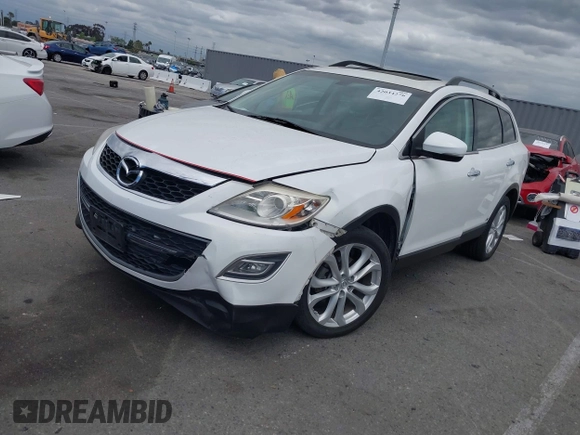 2012 Mazda CX-9 Grand Touring with VIN JM3TB2DV1C0365341, listed as a IAAI auction lot 42034276 with 141,725 mi miles and . Bid and sale history available at DreamBid. Image 2.