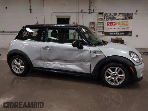 2013 MINI Hardtop with VIN WMWSU3C51DT374317, listed as a IAAI auction lot 41447518 with 142,943 mi miles and . Bid and sale history available at DreamBid. Image 14.