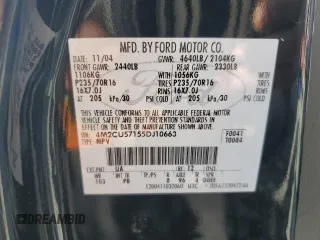 2005 Mercury Mariner Luxury z VIN 4M2CU57155DJ10663, wystawiony jako Copart lot #49102695 z przebiegiem 122 025 mil mil oraz Nie do naprawy. Historia ofert i sprzedaży dostępna na DreamBid. Obrazek 13.