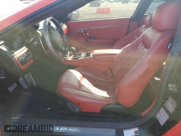 2011 Maserati GranTurismo S с VIN ZAM45KLA5B0059157, выставлен на аукционе Copart как лот 61499065 с пробегом Не указан миль и Чистый • Clean title. История ставок и продаж доступна на DreamBid. Изображение 7.