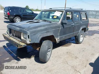 1995 Jeep Cherokee Sport with VIN 1J4FJ68S5SL541413, listed as a IAAI auction lot 42722408 with 335,432 mi miles and . Bid and sale history available at DreamBid. Image 2.