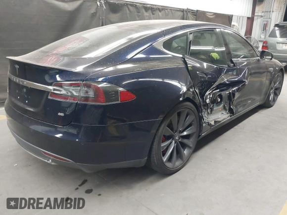 2014 Tesla Model S 60 with VIN 5YJSA1H11EFP56406, listed as a IAAI auction lot 42065157 with Not Provided miles and . Bid and sale history available at DreamBid. Image 4.