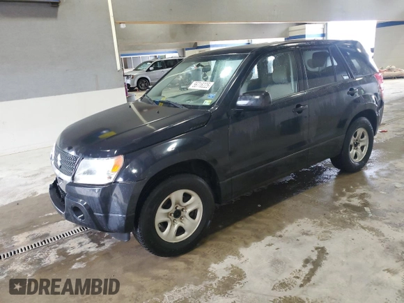 2009 Suzuki Grand Vitara with VIN JS3TE042694100010, listed as a Copart auction lot 56716225 with 148,495 mi miles and Salvage title. Bid and sale history available at DreamBid. Image 1.