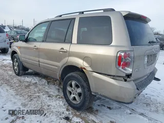 2006 Honda Pilot EX-L with VIN 2HKYF18526H546575, listed as a IAAI auction lot 41414263 with 118,872 mi miles and . Bid and sale history available at DreamBid. Image 3.