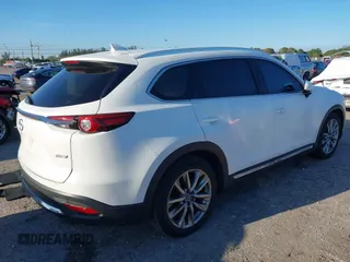 2019 Mazda CX-9 Grand Touring with VIN JM3TCADY3K0305173, listed as a IAAI auction lot 41672448 with 132,265 mi miles. Bid and sale history available at carsss.com. Image 4.