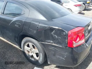 2010 Dodge Charger SXT with VIN 2B3CA3CV2AH124336, listed as a IAAI auction lot 41832204 with 255,562 mi miles and . Bid and sale history available at DreamBid. Image 6.