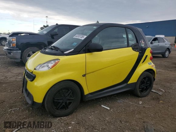 2013 Smart fortwo Pure z VIN WMEEJ3BA2DK663432, wystawiony jako Copart lot #63203755 z przebiegiem 79 786 mil mil oraz Czysty tytuł • Clean title. Historia ofert i sprzedaży dostępna na DreamBid. Obrazek 1.