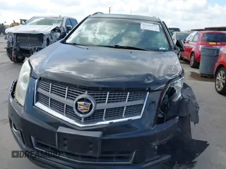 2012 Cadillac SRX Performance Collection with VIN 3GYFNBE31CS603315, listed as a IAAI auction lot 42783877 with 14,529 mi miles and . Bid and sale history available at DreamBid. Image 6.