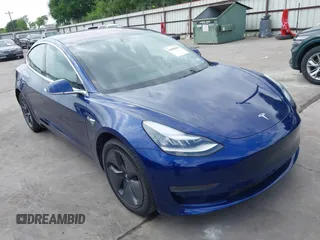 2019 Tesla Model 3 Mid Range with VIN 5YJ3E1EA5KF190453, listed as a IAAI auction lot 41880684 with 58,909 mi miles. Bid and sale history available at carsss.com. Image 1.