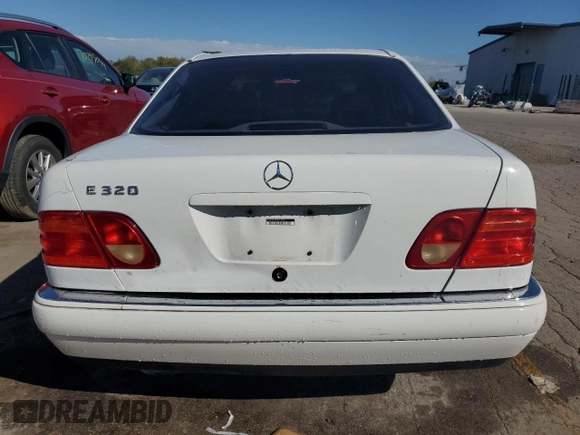 1999 Mercedes-Benz E-Class with VIN WDBJF65HXXA914389, listed as a Copart auction lot 72935884 with 192,084 mi miles and Salvage Title. Bid and sale history available at carsss.com. Image 6.