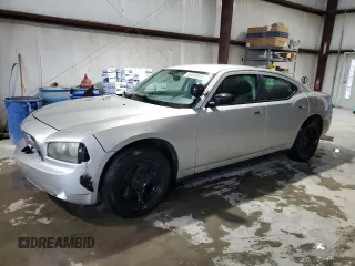 2009 Dodge Charger Police z VIN 2B3KA43T59H567737, wystawiony jako Copart lot #58389005 z przebiegiem 275 982 mil mil oraz Szkoda całkowita • Salvage title. Historia ofert i sprzedaży dostępna na DreamBid. Obrazek 1.