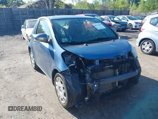 2012 Scion iQ z VIN JTNJJXB05CJ021301, wystawiony jako IAAI lot #42323450 z przebiegiem 97 185 mil mil oraz . Historia ofert i sprzedaży dostępna na DreamBid. Obrazek 1.