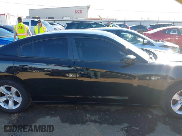 2014 Dodge Charger SE with VIN 2C3CDXBG9EH116776, listed as a IAAI auction lot 41465565 with 128,319 mi miles. Bid and sale history available at carsss.com. Image 14.