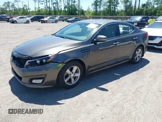 2014 Kia Optima LX with VIN 5XXGM4A71EG335165, listed as a IAAI auction lot 42052378 with 154,574 mi miles. Bid and sale history available at carsss.com. Image 2.