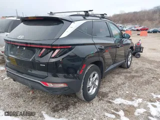 2022 Hyundai Tucson SEL with VIN 5NMJBCAEXNH141045, listed as a IAAI auction lot 41433930 with 46,863 mi miles. Bid and sale history available at carsss.com. Image 4.