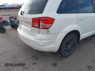 2017 Dodge Journey SE with VIN 3C4PDCAB6HT670624, listed as a IAAI auction lot 41777947 with 143,496 mi miles and . Bid and sale history available at DreamBid. Image 6.