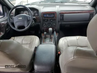 2001 Jeep Grand Cherokee Limited with VIN 1J4GW58N91C653866, listed as a Copart auction lot 58546895 with 159,661 mi miles and Salvage title. Bid and sale history available at DreamBid. Image 8.