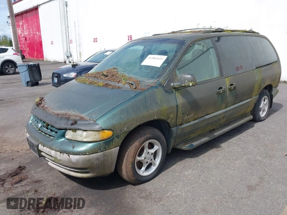 1999 Plymouth Voyager Grand SE z VIN 1P4GP44G0XB579719, wystawiony jako IAAI lot #41981925 z przebiegiem 163 940 mil mil oraz . Historia ofert i sprzedaży dostępna na DreamBid. Obrazek 2.